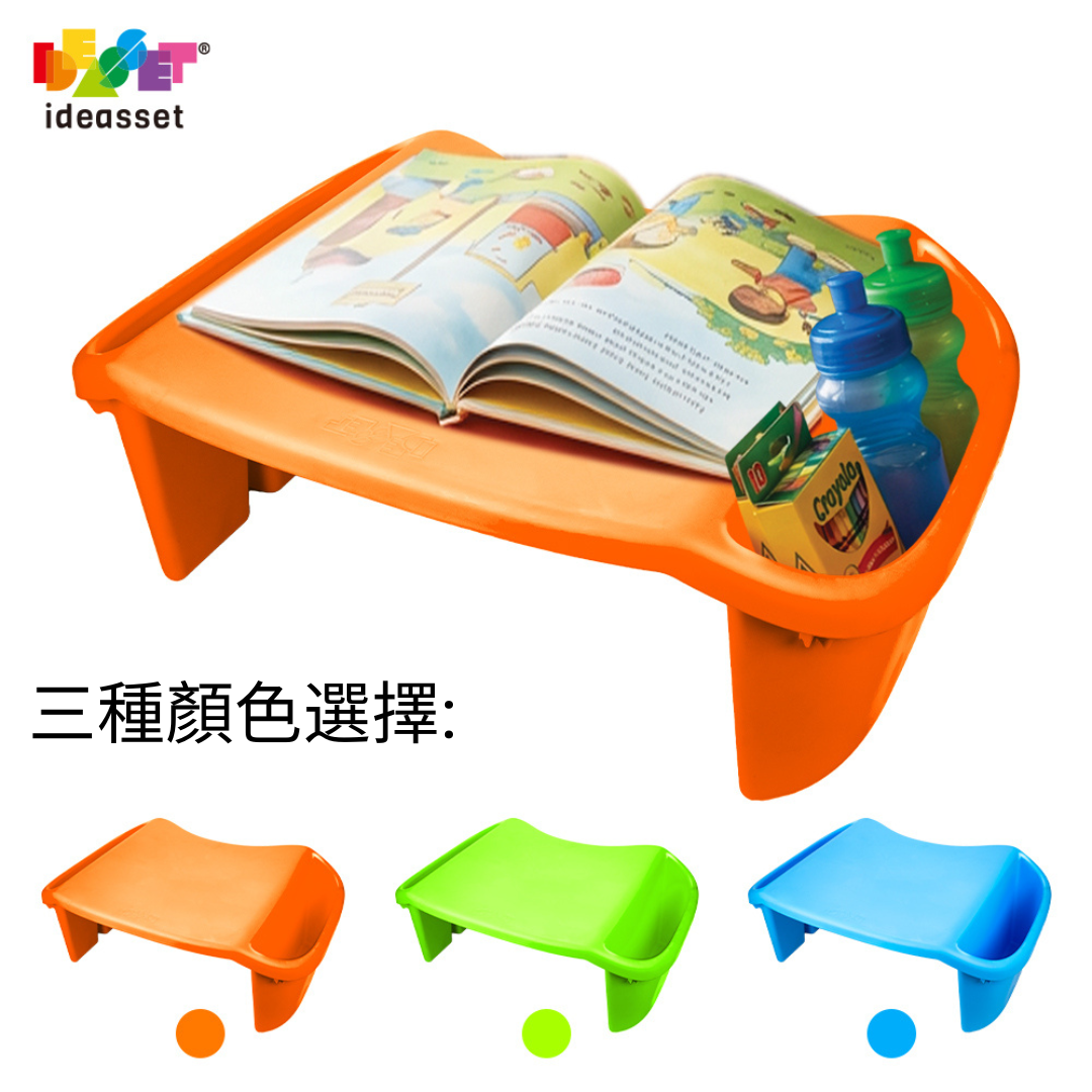 An orange plastic knee desk or lap desk shown on a white background, with an open book and two water bottles placed on it. The image also includes smaller views of the same desk in orange, green, and blue, with Chinese text indicating color options.